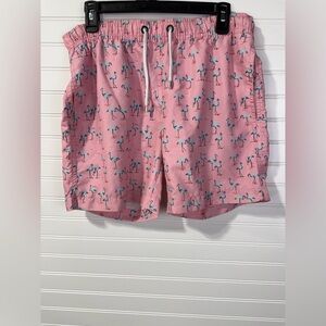 Franks men’s pink flamingo swim trunk style shorts. Size small.